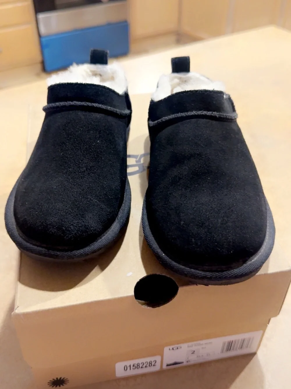 UGG Kids Black Suede Slip-On Clog with Shearling Trim